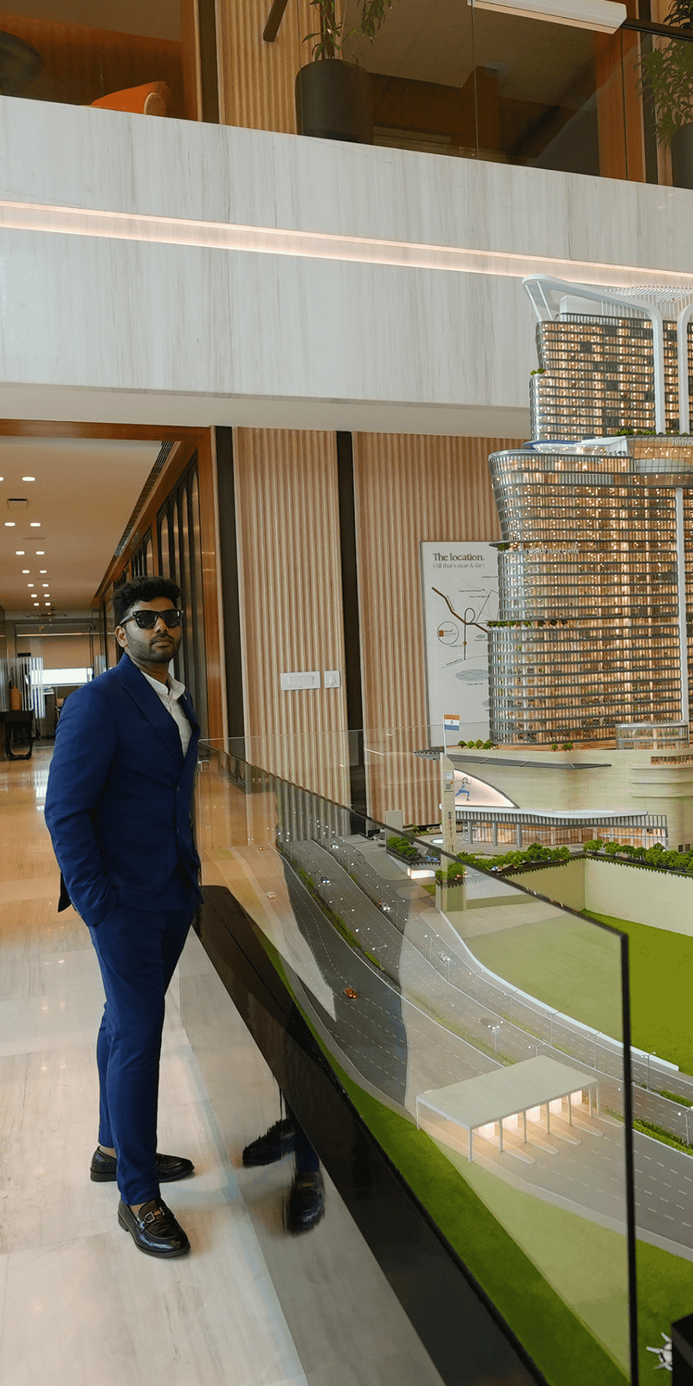 Vamsy Bovilla presenting project scale model left section office